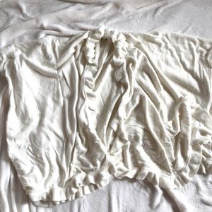 Beautiful and Soft Cream Poncho with Ruffle Trim